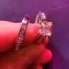 Stylish men's and women's couple jewelry set featuring shiny square cubic zirconia wedding rings, perfect for engagement, anniversaries, or special occasions.