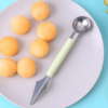 Stainless steel watermelon baller and carving knife, designed for effortlessly scooping and carving watermelon.