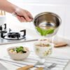Anti-spill plastic soup funnel designed for pouring soups and liquids without mess.