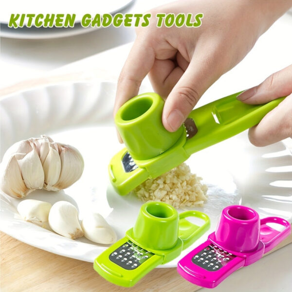 Manual garlic press and grater tool for crushing and grating garlic and ginger.