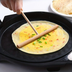 Bamboo T-shaped pancake spreader, reusable and easy to clean, perfect for home and professional use.