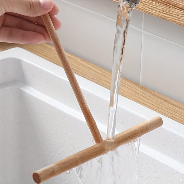 Bamboo T-shaped pancake spreader, reusable and easy to clean, perfect for home and professional use.