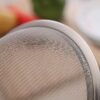 Stainless steel wide-rimmed fine mesh skimmer spoon for filtering oil and soy milk