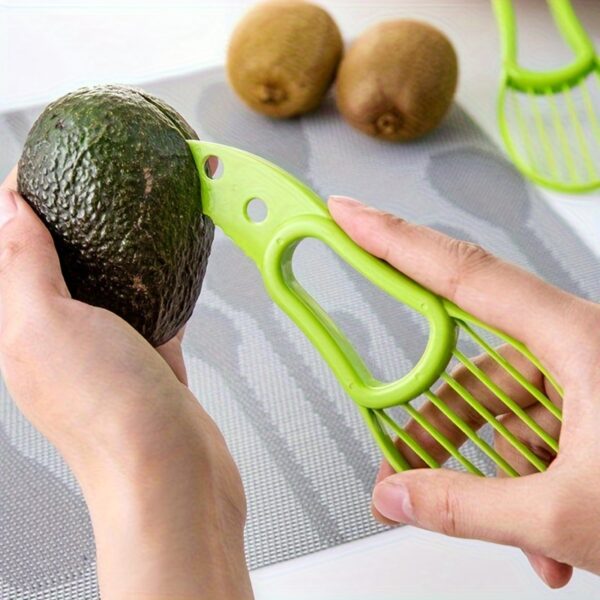 Multifunctional avocado slicer and peeler tool with ergonomic handle for easy cutting and peeling.