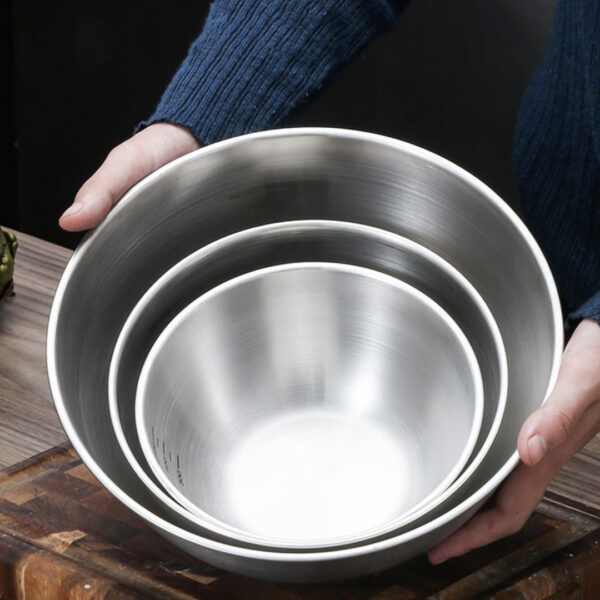 1Pc Stainless Steel Mixing Bowl with Measuring Guide for precise ingredient mixing and measuring.