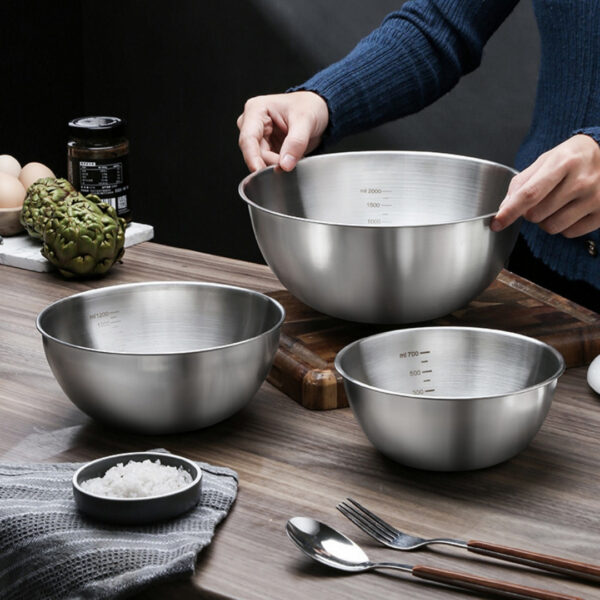 1Pc Stainless Steel Mixing Bowl with Measuring Guide for precise ingredient mixing and measuring.