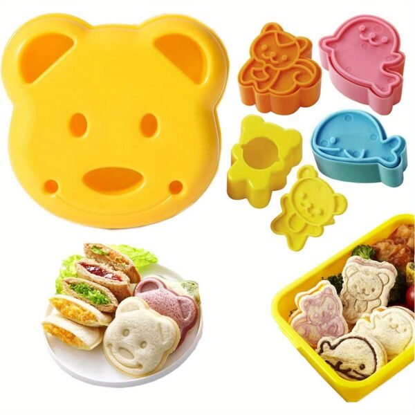 Cartoon animal sandwich cutter set with bento and holiday-themed molds for fun, shaped sandwiches.