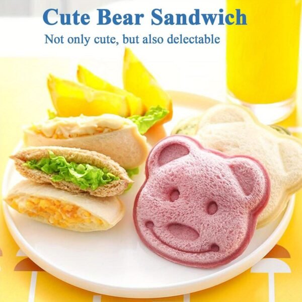 Cartoon animal sandwich cutter set with bento and holiday-themed molds for fun, shaped sandwiches.