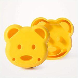 Cartoon animal sandwich cutter set with bento and holiday-themed molds for fun, shaped sandwiches.