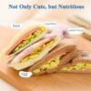 Cartoon animal sandwich cutter set with bento and holiday-themed molds for fun, shaped sandwiches.