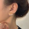 Elegant alloy heart-shaped stud earrings with faux pearls, versatile double-wear design, ideal for Christmas and Thanksgiving gifts.