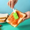 Single silicone spatula butter cream scraper with a flexible, non-stick surface for smooth spreading.
