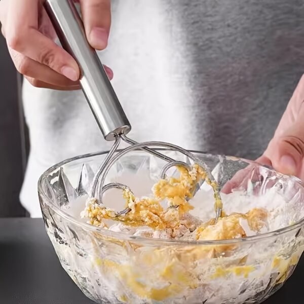 Stainless steel whisk with double-eye rings, perfect for mixing flour, beating cream, and dough mixing in baking and cooking.