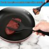 2-in-1 non-stick pan flipper for pancakes, eggs, and more; durable polypropylene spatula with hanging hole.