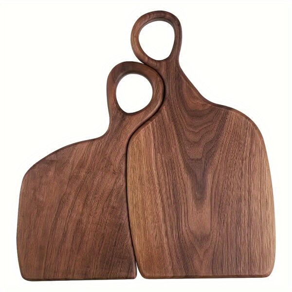 2-piece walnut chopping board set made from solid wood with form-fitting design and hanging hole