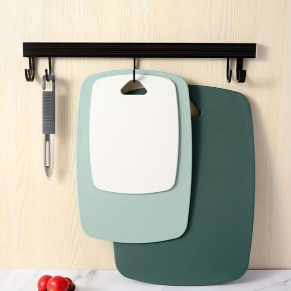 3-piece plastic cutting board set, dishwasher safe, for easy food prep and cleaning.