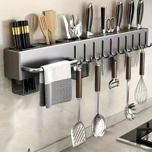 Wall-mounted carbon steel kitchen utensil holder for organizing cooking tools and utensils.