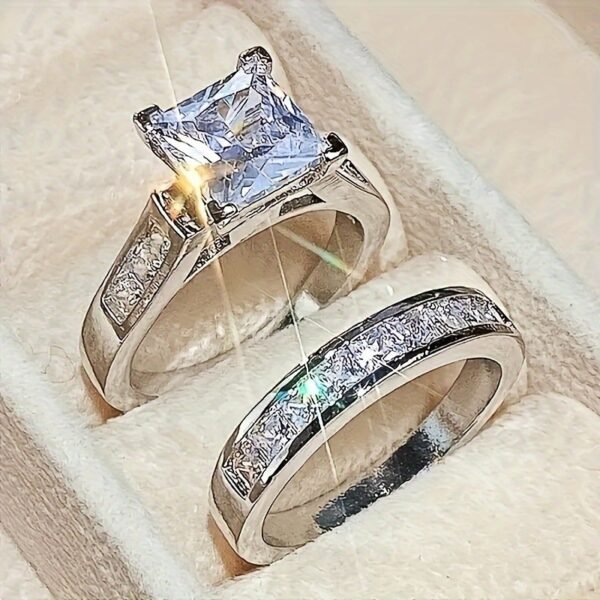Stylish men's and women's couple jewelry set featuring shiny square cubic zirconia wedding rings, perfect for engagement, anniversaries, or special occasions.