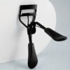 Portable Stainless Steel Eyelash Curler with comfort grip, achieving perfect curls in 5 seconds without hurting eyelashes. Suitable for all eye types.