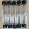 Set of 10 plastic pepper shakers, each with a 100ml capacity, featuring a perforated lid for easy dispensing.