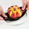 Stainless steel apple slicer and corer, designed for quickly slicing and coring apples with ease.