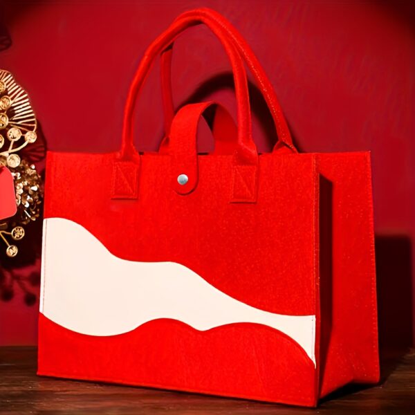 Chic colorblock felt tote bag for women with large capacity, secure closure, and wrist strap.