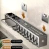 Wall-mounted carbon steel kitchen utensil holder for organizing cooking tools and utensils.