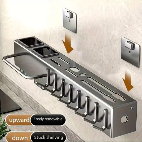 Wall-mounted carbon steel kitchen utensil holder for organizing cooking tools and utensils.