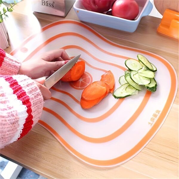 Portable, bendable cutting board designed for versatile use in the kitchen, with flexible, lightweight material.