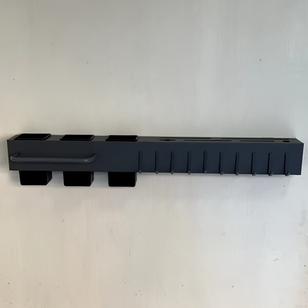 Wall-mounted carbon steel kitchen utensil holder for organizing cooking tools and utensils.