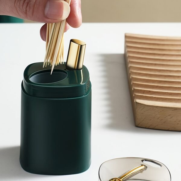 Automatic pop-up toothpick holder dispenser with sleek design for easy access.