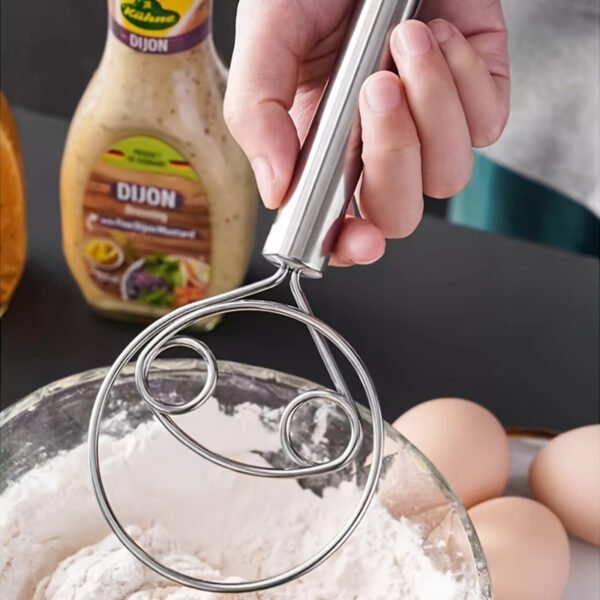 Stainless steel whisk with double-eye rings, perfect for mixing flour, beating cream, and dough mixing in baking and cooking.
