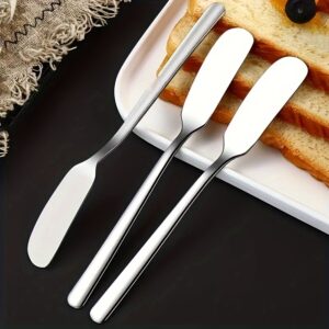 Modern 2-piece stainless steel spreader set, perfect for butter, cheese, and versatile kitchen and dining use.