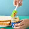 Single silicone spatula butter cream scraper with a flexible, non-stick surface for smooth spreading.