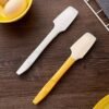 Silicone jam scraper, non-stick icing scraper, and multipurpose kitchen tool for baking and cleaning.