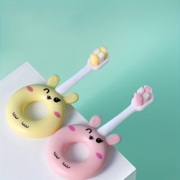 Soft silicone baby toothbrush for toddlers 0-3 years, gentle cleaning with super soft bristles, cute cartoon design.