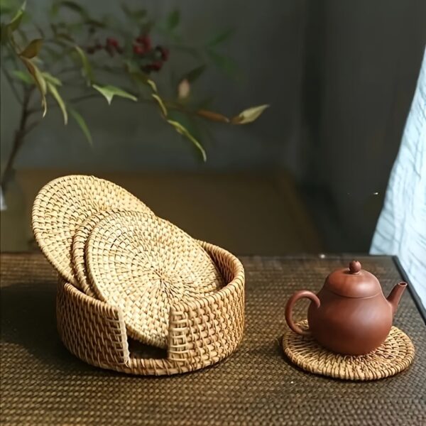 Handcrafted rattan coasters with autumn vine design, perfect for protecting surfaces from drink marks.