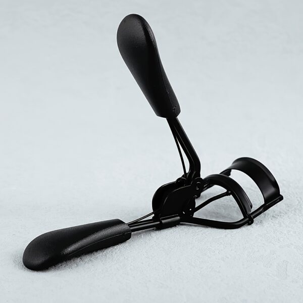 Portable Stainless Steel Eyelash Curler with comfort grip, achieving perfect curls in 5 seconds without hurting eyelashes. Suitable for all eye types.