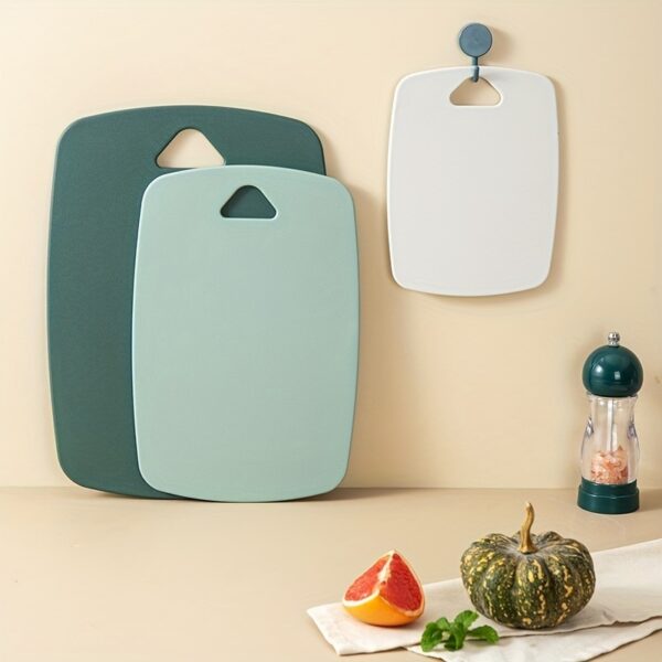 3-piece plastic cutting board set, dishwasher safe, for easy food prep and cleaning.