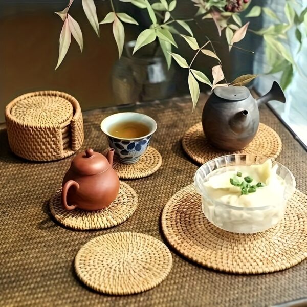 Handcrafted rattan coasters with autumn vine design, perfect for protecting surfaces from drink marks.