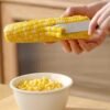 Stainless steel corn on the cob remover tool for fast and safe kernel removal.