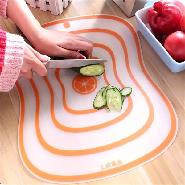 Portable, bendable cutting board designed for versatile use in the kitchen, with flexible, lightweight material.