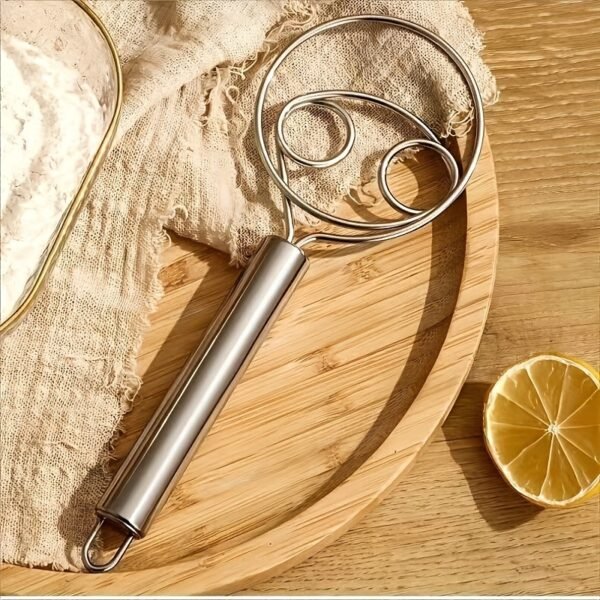 Stainless steel whisk with double-eye rings, perfect for mixing flour, beating cream, and dough mixing in baking and cooking.