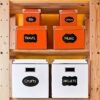 32-piece food storage container set with clear lids and labels for easy organization and storage.