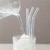 Sustainable glass straw set with cleaning brush for eco-friendly drinking