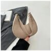Fashion top-handle handbag for women in black, khaki, and green with solid color design, fixed shoulder straps, faux leather lining, and zipper closure.