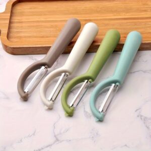 Stainless steel paring knife with multifunctional peeler for precise cutting and peeling.