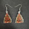 Charming vintage-inspired Christmas tree acrylic dangle earrings, lightweight and durable, perfect for holiday celebrations.