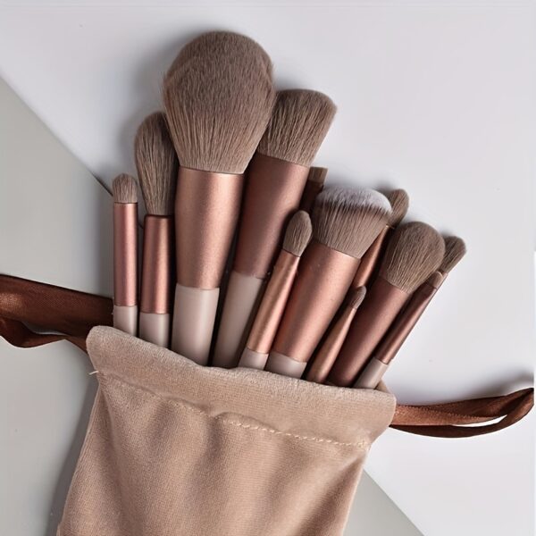 13-piece professional makeup brush set with soft nylon bristles, oval design for eyeshadow, foundation, and blush application, fragrance-free and suitable for all skin types.