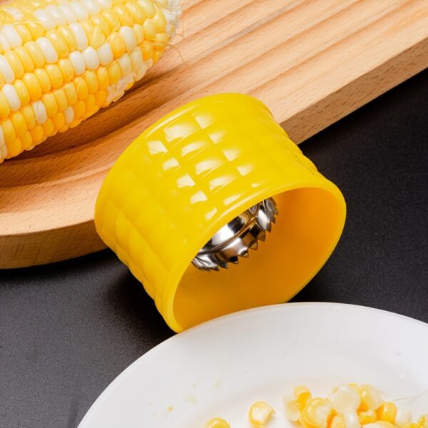 Stainless steel corn cob sheller for easy and manual removal of corn kernels.